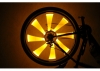 Оранжевая велоподсветка колес велосипеда
