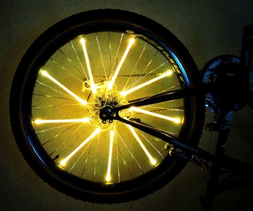 Оранжевая подсветка для колес велосипеда